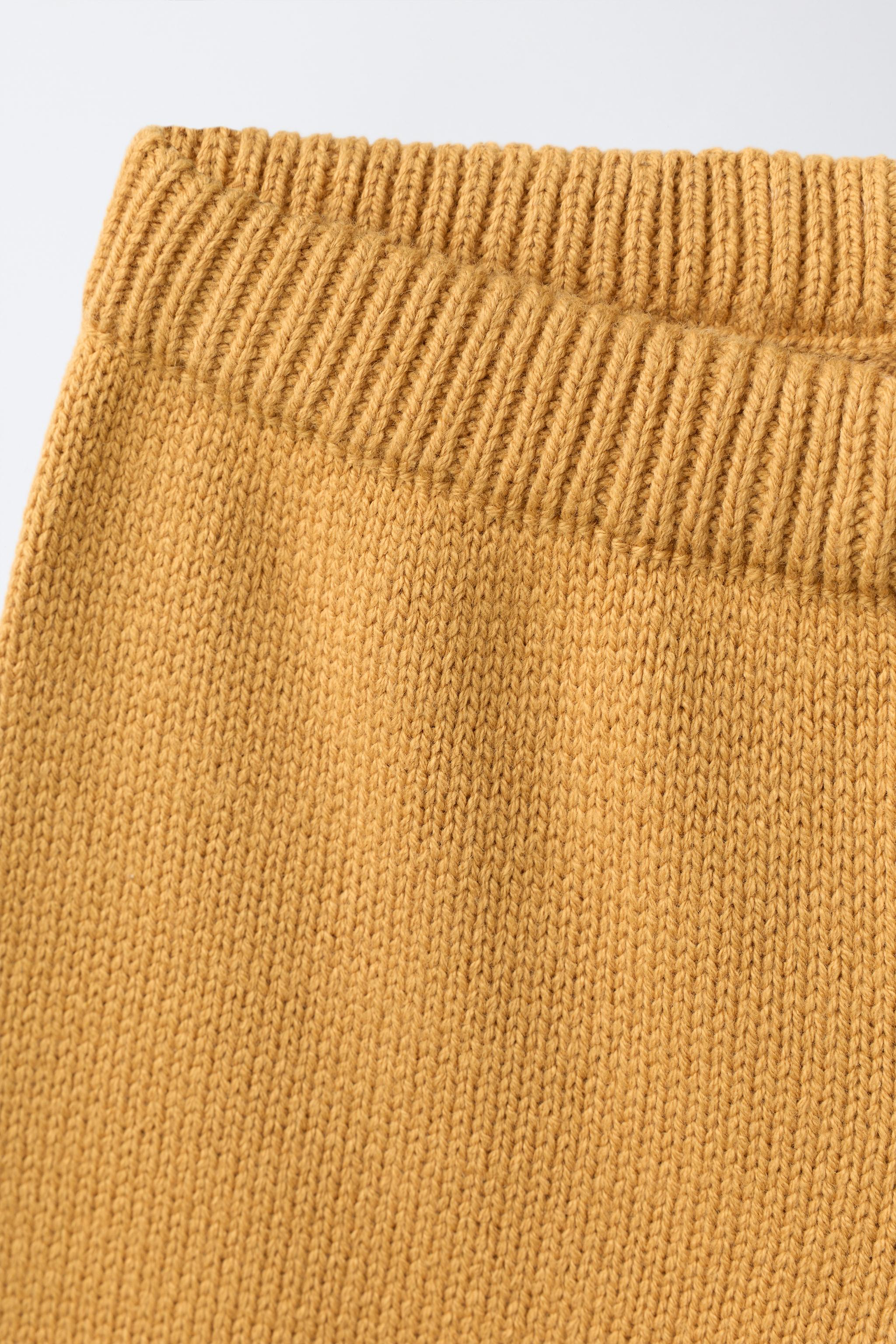 PANTALON JUPE-CULOTTE EN MAILLE À FLEURS BRODÉES